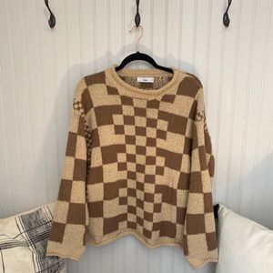 Brown and tan checkered sweater
